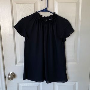 Black ruffle mock neck top